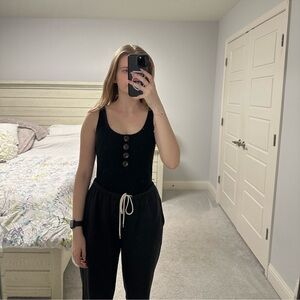 Heart & Hips black ripped sleeveless bodysuit with button detailing size M